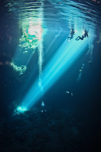 Divers coming back out of Kilsby's Sinkhole near Mt Gambi... by Mick Tait 